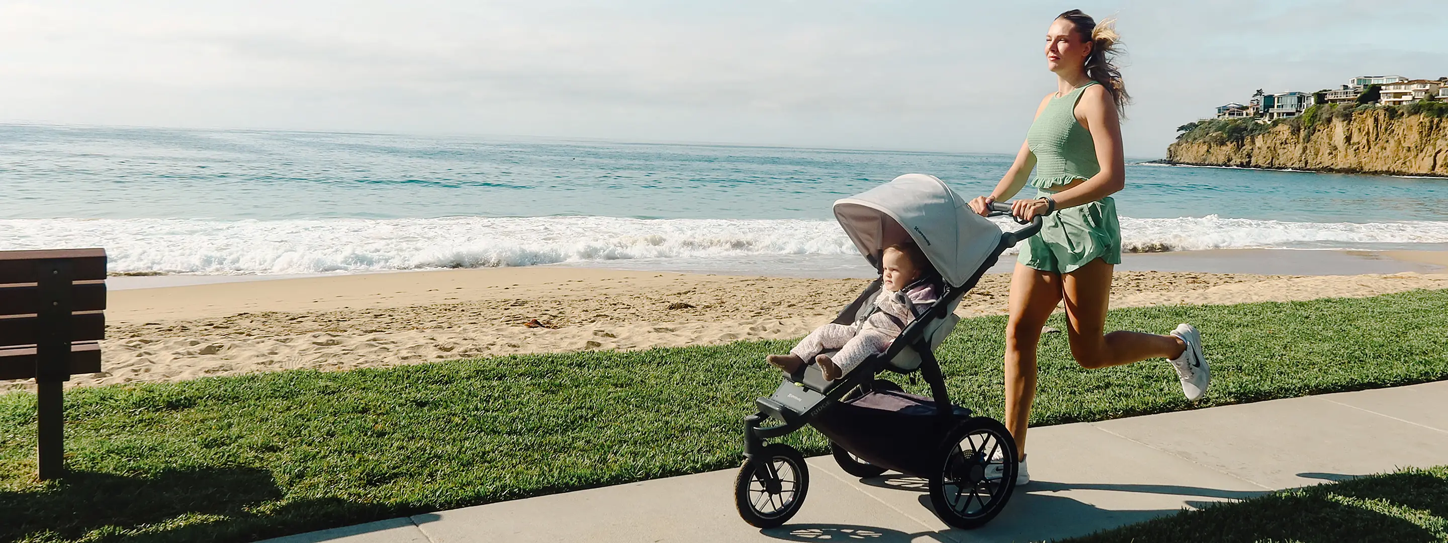 woman jogging with stroller